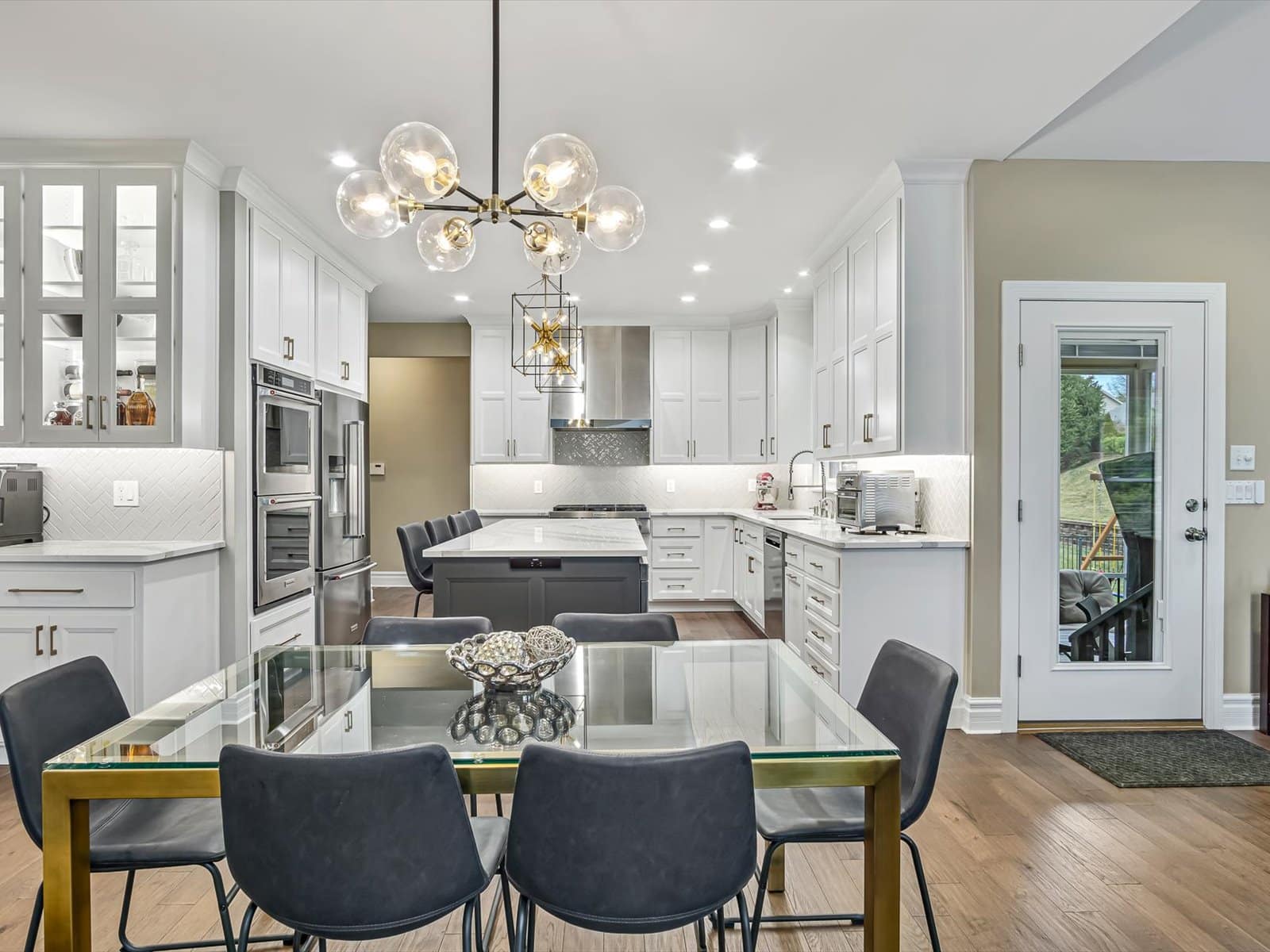 large white and gray kitchen remodel in st louis, mo by Thompson Price