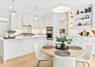 Clean St Louis kitchen remodeling project with white custom cabinetry.