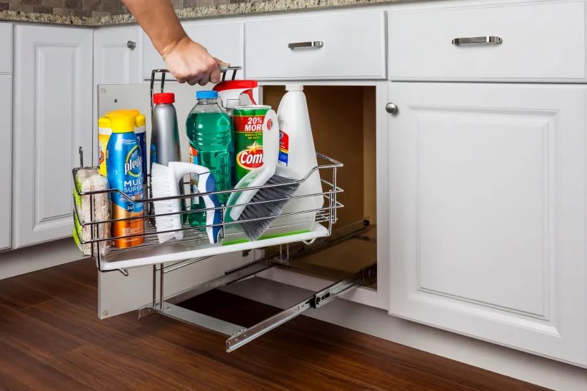 Thompson Price other cabinet storage and organizers showing an under-sink removable organizer that holds cleaning products