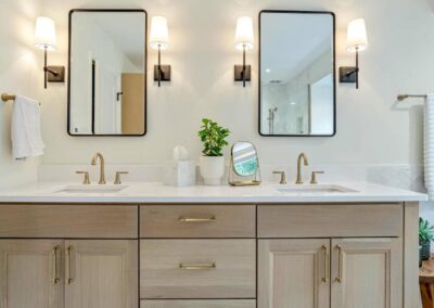 Custom double vanity cabinet in light stain on Maple wood.