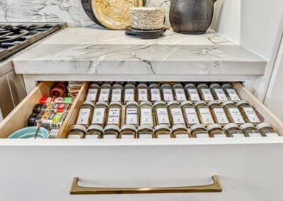 St Louis kitchen remodel showing custom spice drawer storage.