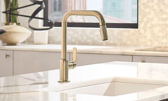 Thompson Price kitchen remodeling in St Louis showing Brizo Litze kitchen faucet in bronze finish