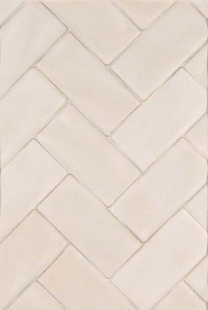 Thompson Price kitchen backsplash ideas 3x6 handcrafted tile in antique white shown in herringbone pattern