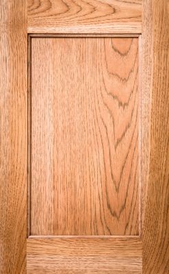 Classic square recessed cabinet door style in light stain