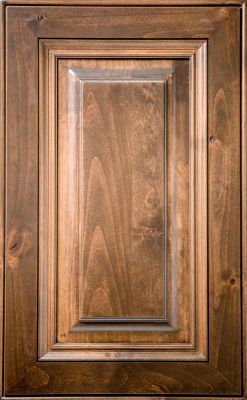 Nantucket raised panel cabinet door with 3" stiles and rails in medium stain