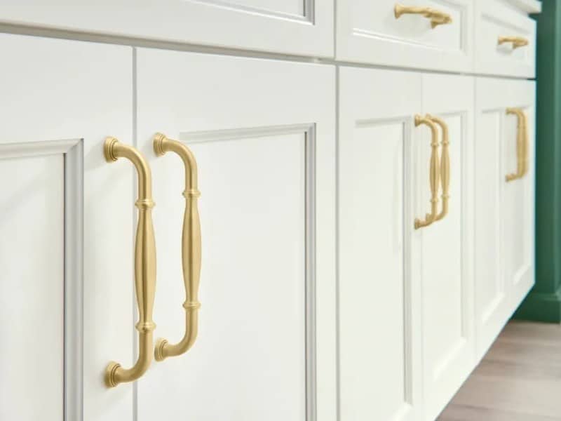 Traditional style cabinet door pulls in brushed gold finish